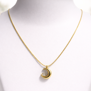 The Golden Crescent Crystal Pendant